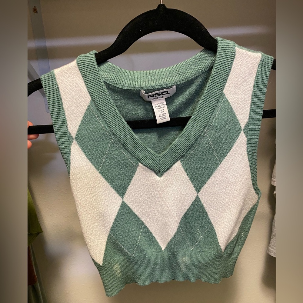 Teal and white sweater vest from Tilly’s